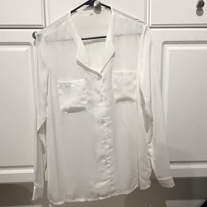 Women’s large button-down the front shirt with pockets. Long sleeve. White.